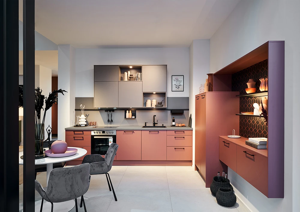 Masterclass Solva kitchen in Vintage Rose with a freestanding island and classic shaker design.