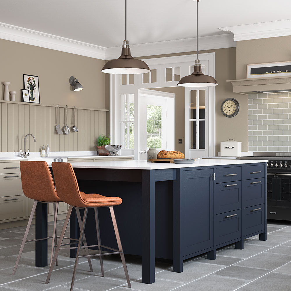 Modern Masterclass kitchen with Neff appliance integrated into the worktop, viewed across a breakfast bar with three stools.